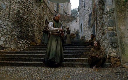 Arya Stark is blind and begging on the streets of Braavos